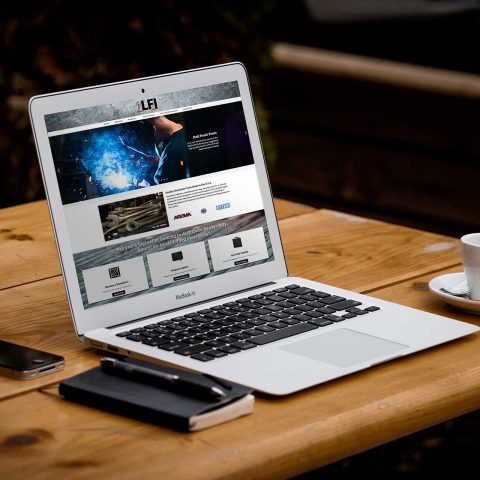 Azula Web LFI tools website on laptop.