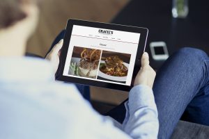 Azula Web Gracie's Bistro restaurant website on tablet.