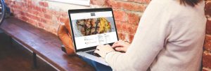 Azula Web Wrought Iron Grill restaurant website on laptop.